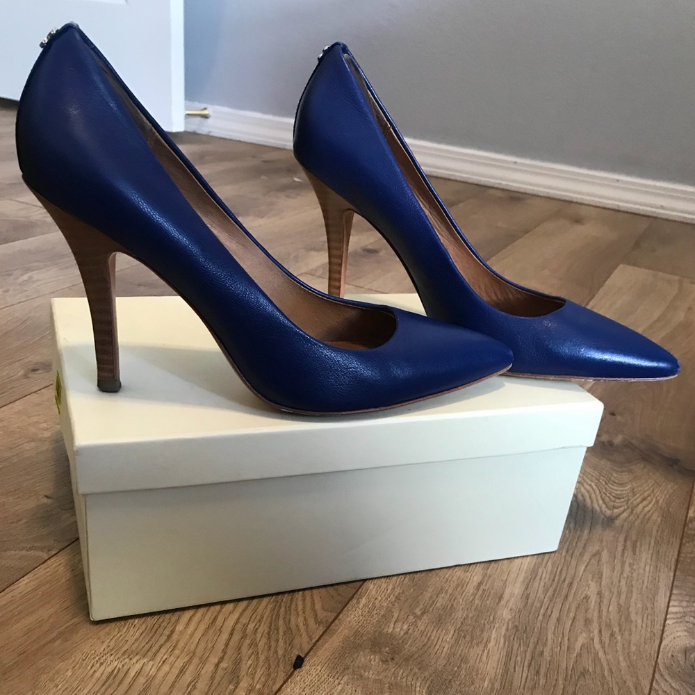 Navy Coach heels